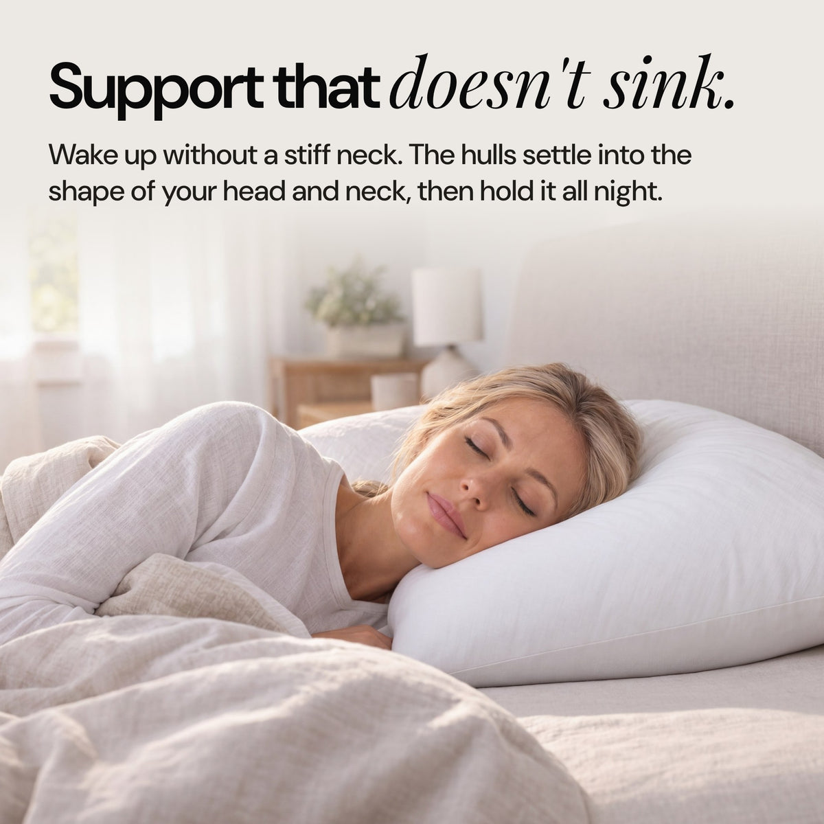 Woman sleeping on her side on the No Fluff buckwheat pillow: support that doesn't sink